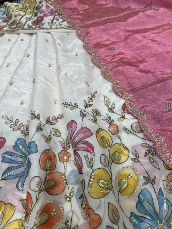 Fandy silk with position print with self blouse along with contrast Duppata with cut work border