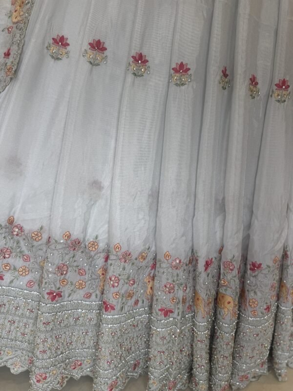 Tissue lehenga with all over botti along with heavy  border with self blouse with self dupatta with cut work border (full set) - Image 3