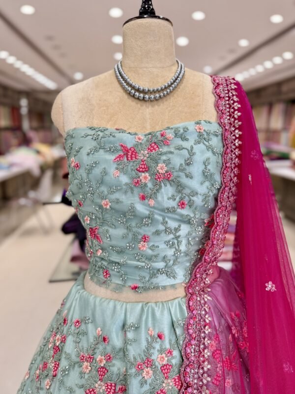Netted jarqan work lehenga with self blouse along with Netted cut work dupatta (full set) - Image 2