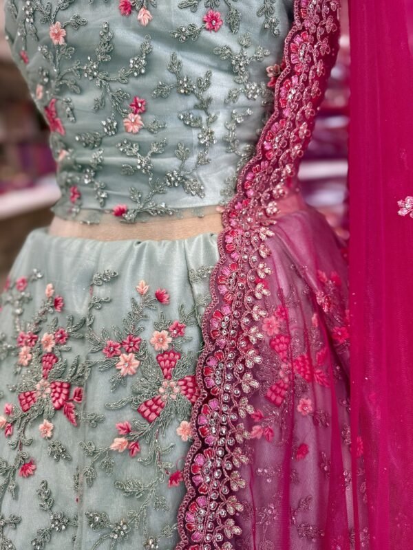 Netted jarqan work lehenga with self blouse along with Netted cut work dupatta (full set) - Image 3