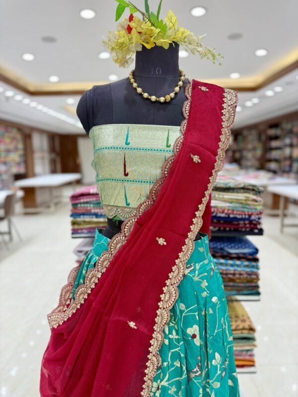 Dola slik lehenga all over design along with munia border with self blouse along with shimmer chiffon cut work dupatta semi stitch (full set) - Image 2