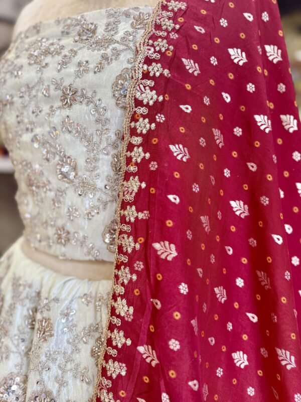 Tissue Lehenga and blouse along with all over kardana and copper seqance work along with contrast bandini cut work dupatta (full set) - Image 3